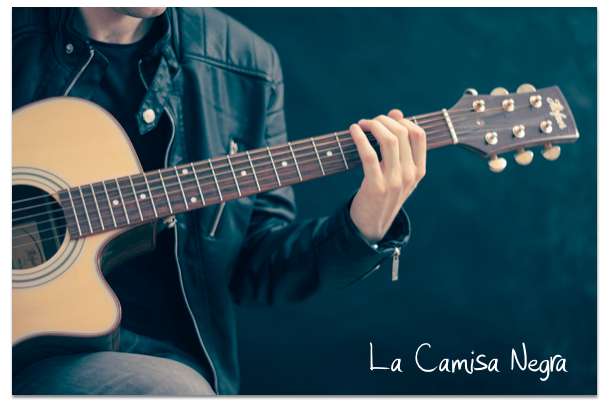 Image of Man playing guitar